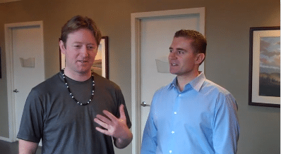 Patient telling his experience to Dr. Derek Strachan