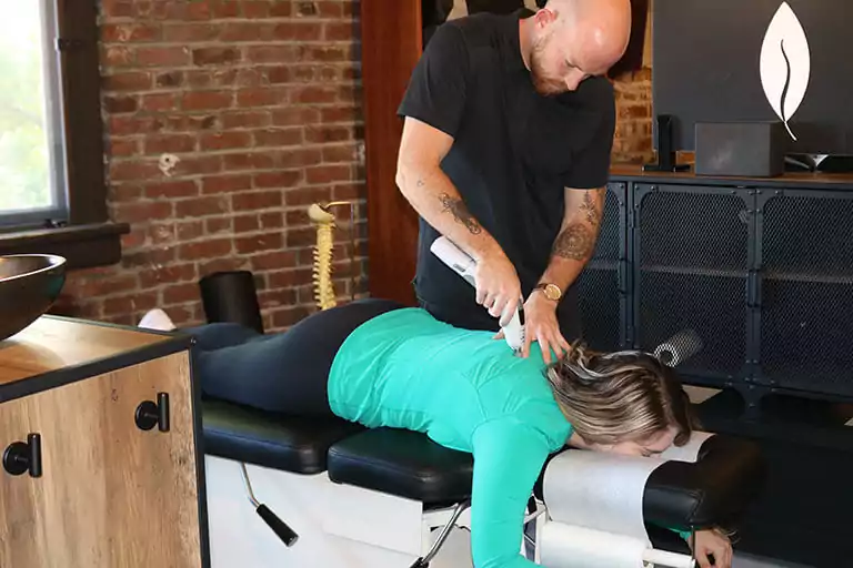 Dr. Conner doing adjustment on patient